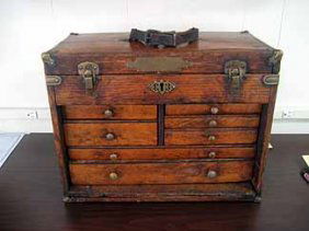 Antique oak machinist's tool box with hinged lift top 