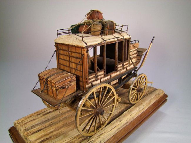 Hand carved Stagecoach By Oscar M. Cortes : Lot 228