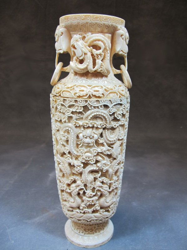 Antique Chinese carved ivory vase Lot 223