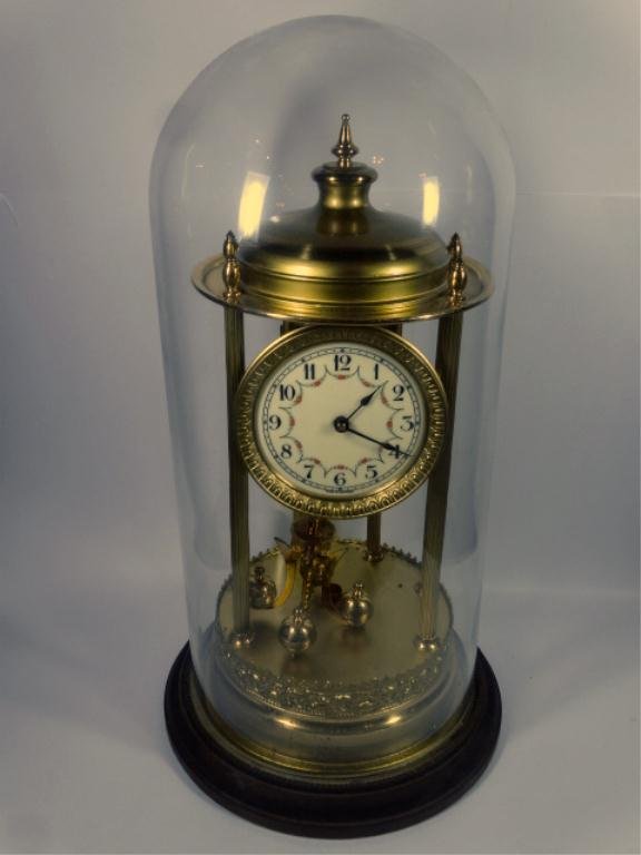BRASS ANNIVERSARY CLOCK, MADE IN GERMANY, GLASS DOME, Lot 210