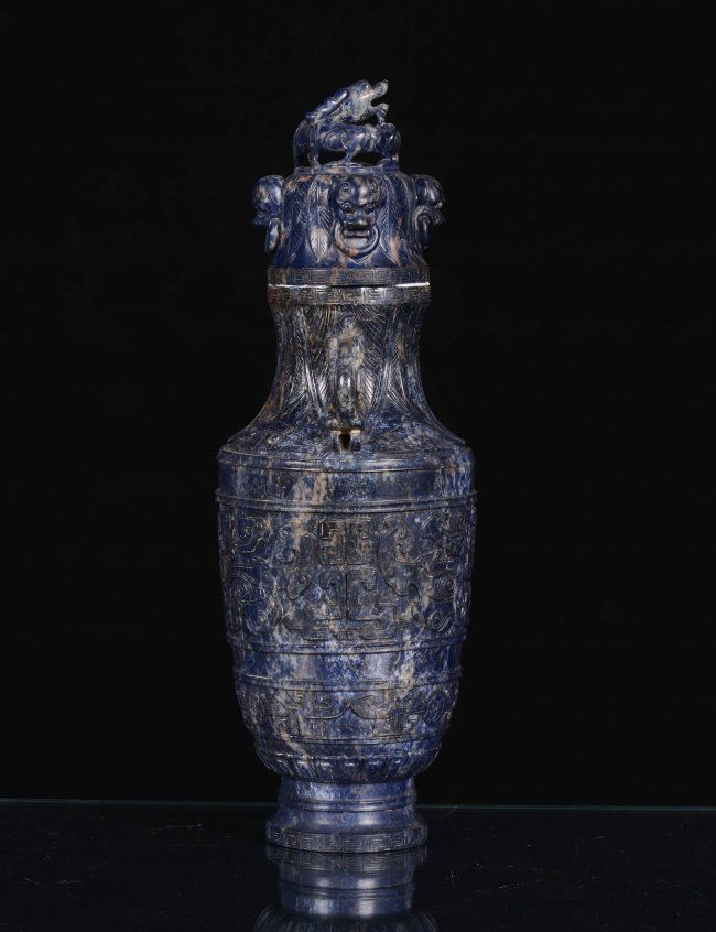 A lapis lazuli vase carved with archaic motives, China, : Lot 402A