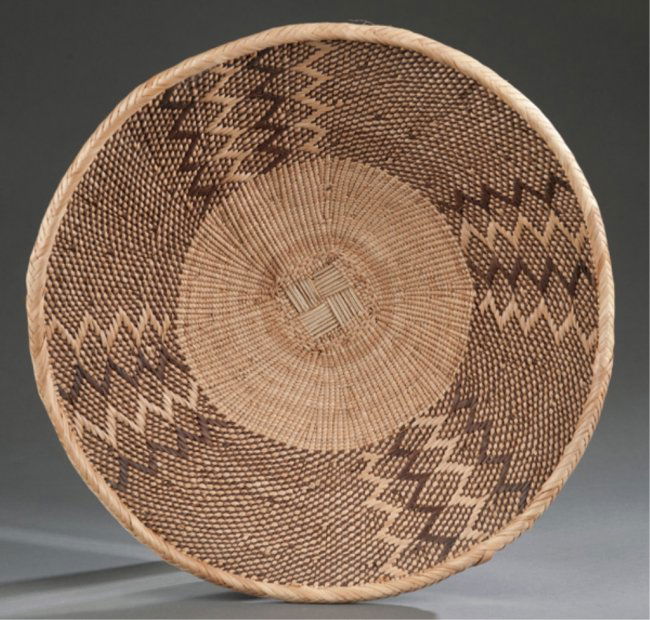 35 Flat woven basket, probably African. Lot 35