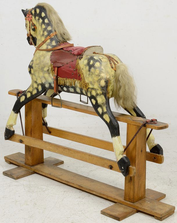 AN ANTIQUE PAINTED GLIDING ROCKING HORSE : Lot 128