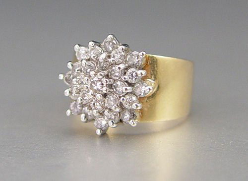 229: 14K WIDE BAND DIAMOND CLUSTER RING : Lot 229