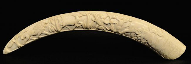 216: WELL CARVED AFRICAN IVORY ELEPHANT TUSK, 35"L : Lot 216