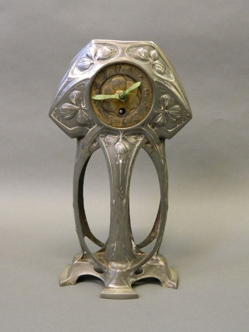 A C19th Continental Art Nouveau pewter mantle clock, Lot 848