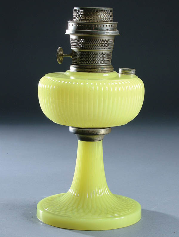 420 AN ALADDIN VERTIQUE MOONSTONE LAMP in vaseline co Lot 420