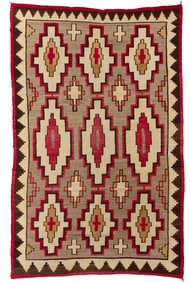 A large room sized Navajo regional rug