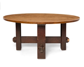 A large Charles Stickley oak dining table