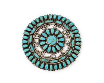 A Larry Moses Begay Navajo sterling silver and turquoise pendant/brooch