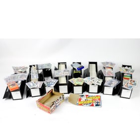 A large group of over 5000 baseball, basketball, and hockey cards