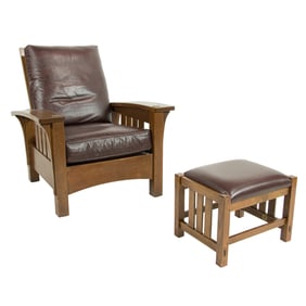 A Stickley Audi Arts and Crafts style bow arm morris chair and ottoman