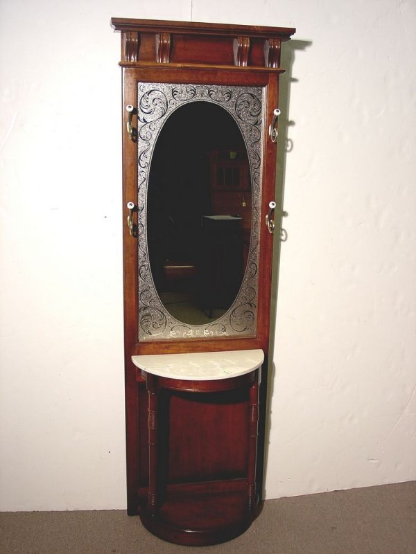349 MIRRORED MARBLE TOP HALL TREE, having an etched ov Lot 349