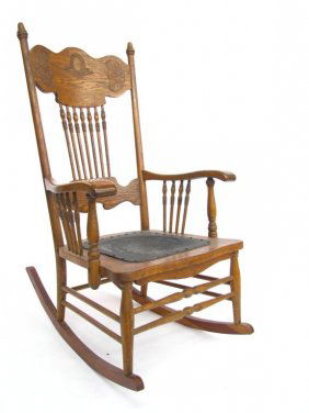 559: Antique Oak Pressed Back Rocking Chair : Lot 559