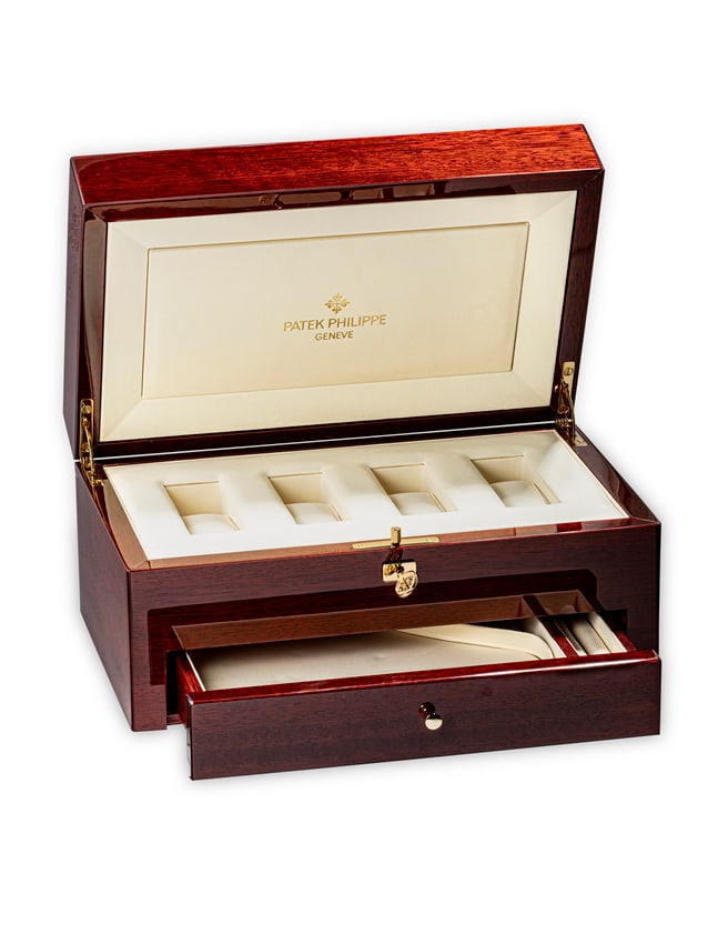 PATEK PHILIPPE. A PRESENTATION BOX FOR A SET OF FOUR WATCHES