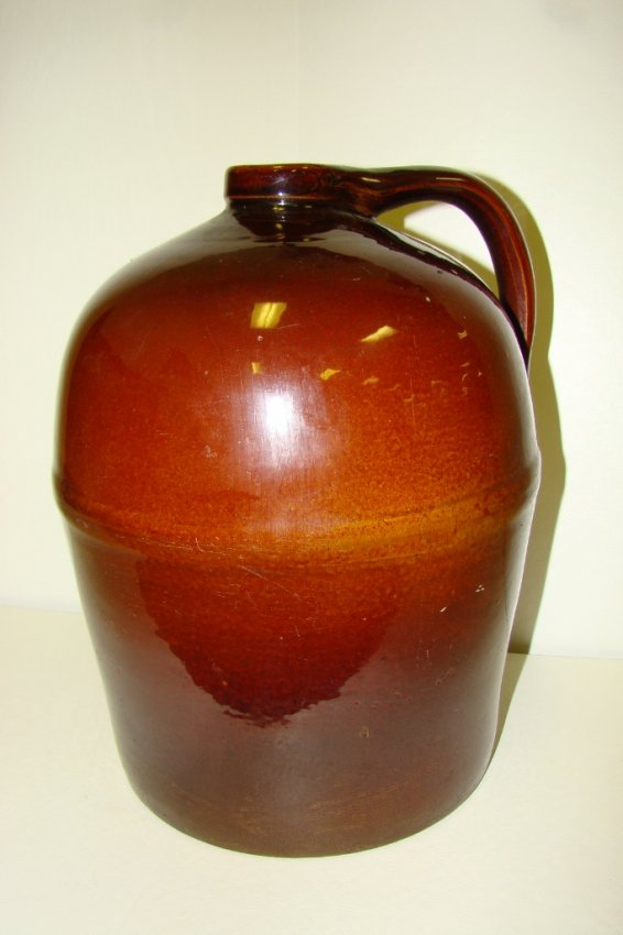 515 Brown stoneware jug 12" high marked Peoria Pottery Lot 515