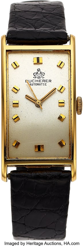12063: Rare Bucherer 18K Yellow Gold Tank Style Automat