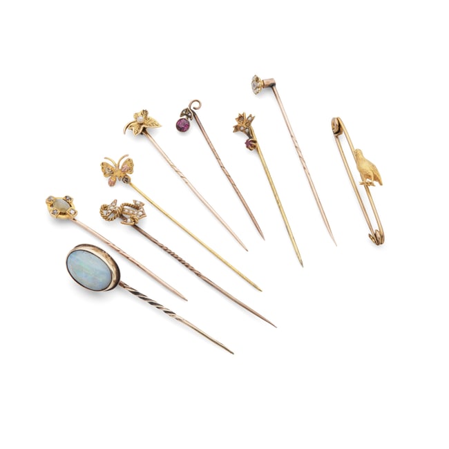 A collection of gem-set tie pins